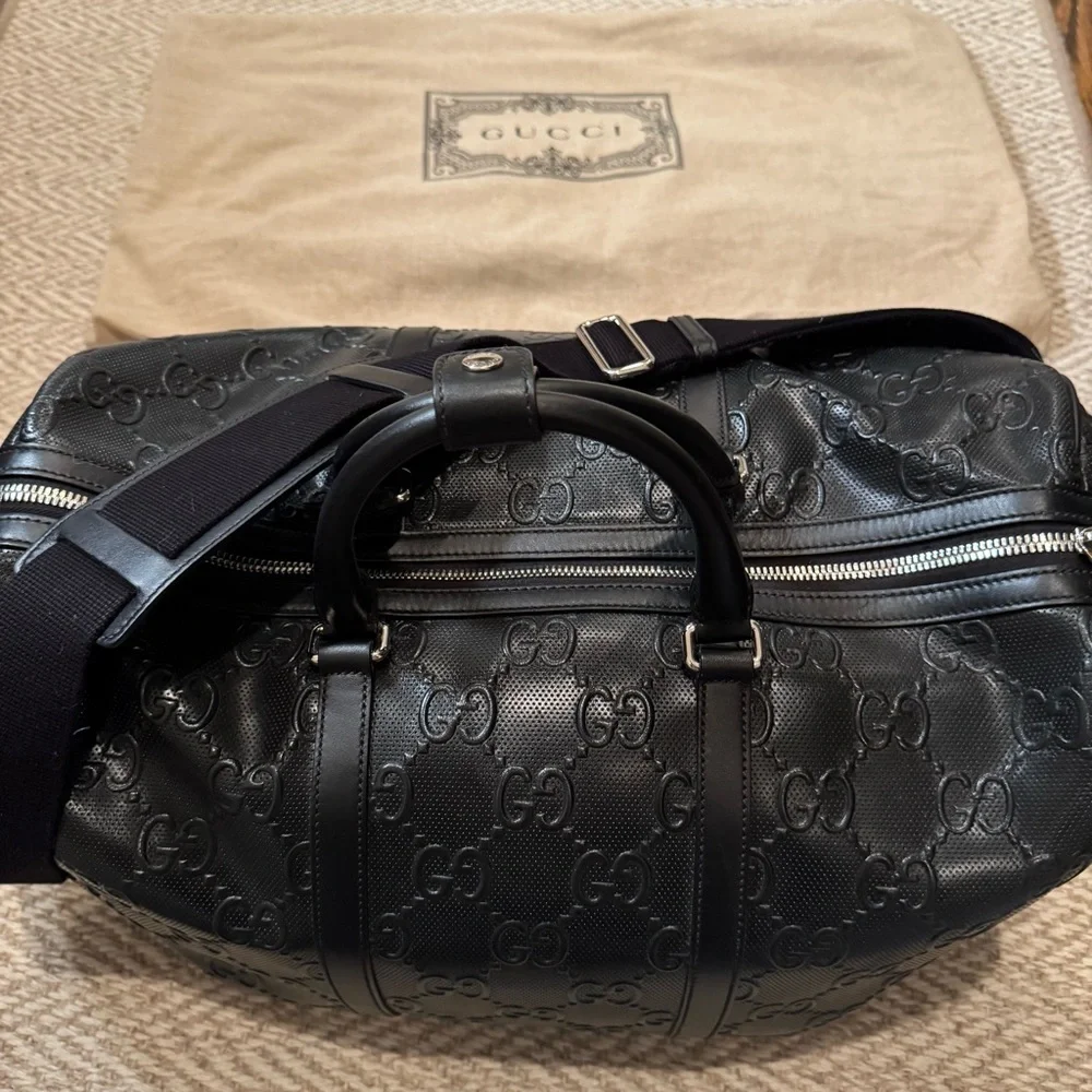 New! Gucci GG embossed black leather duffel bag